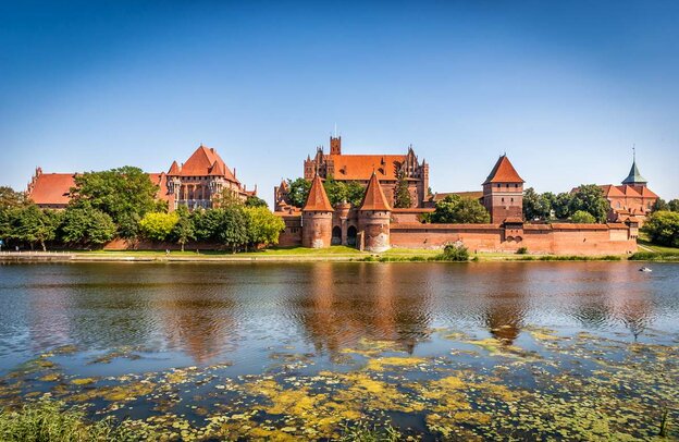 Camping Masuren: Rundreise durch eine der bezauberndsten Landschaften Europas  | © Die Kreuzritterburg in Malbork, Foto: Jan, stock.adobe.com
